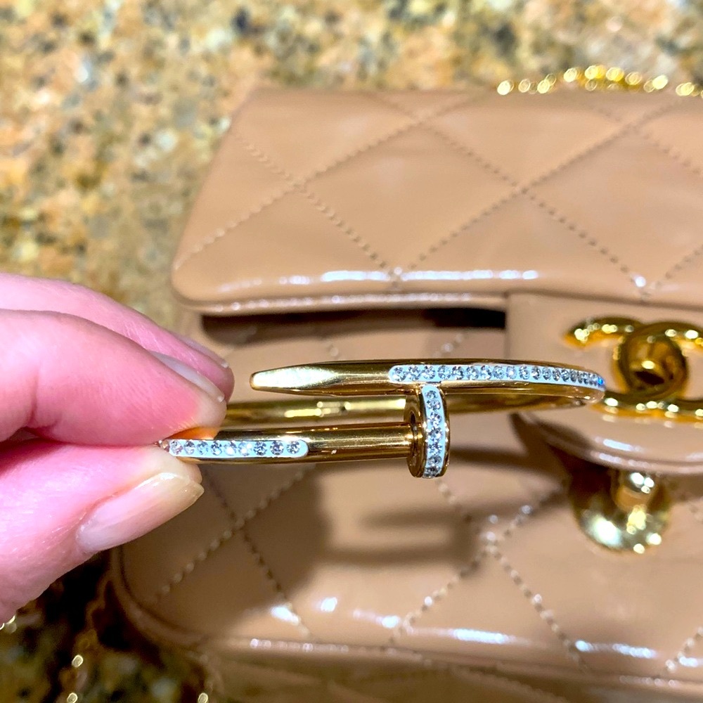 Absolutely stunning design Gold plated Nail Bracelet with Crystals,new condition